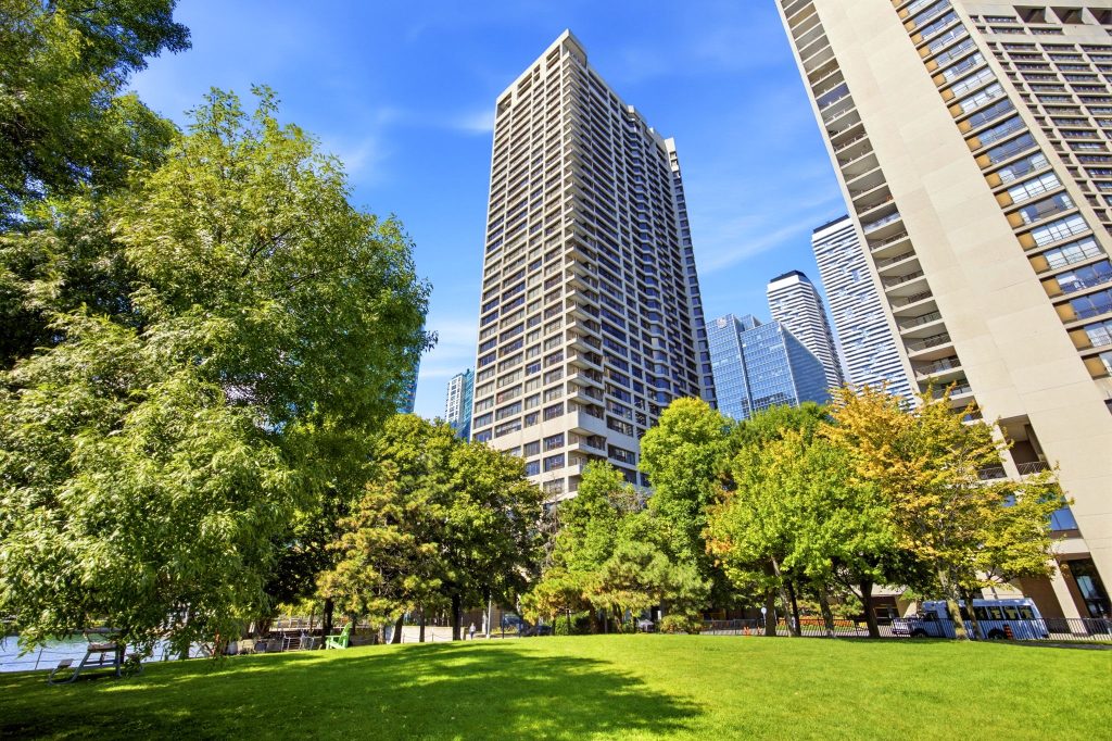 Condominium tower and landscaped grounds at 65 Harbour Square, Toronto