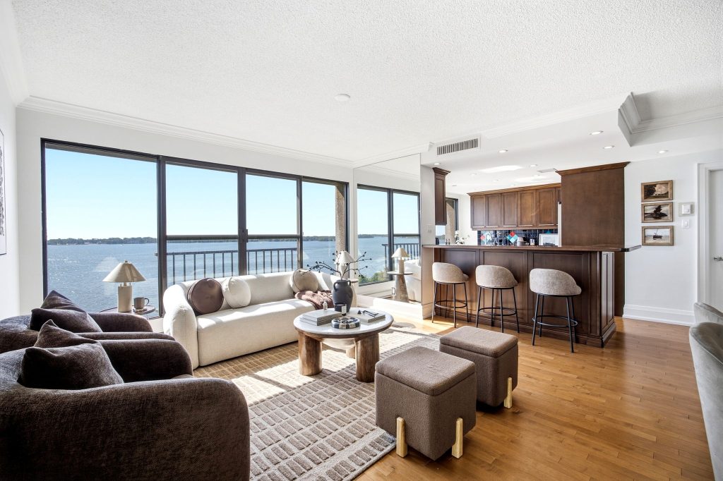Waterfront living room and kitchen at 65 Harbour Square, Toronto